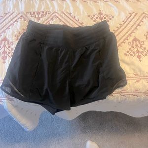 size 8 lululemon hotty hot low rise black shorts